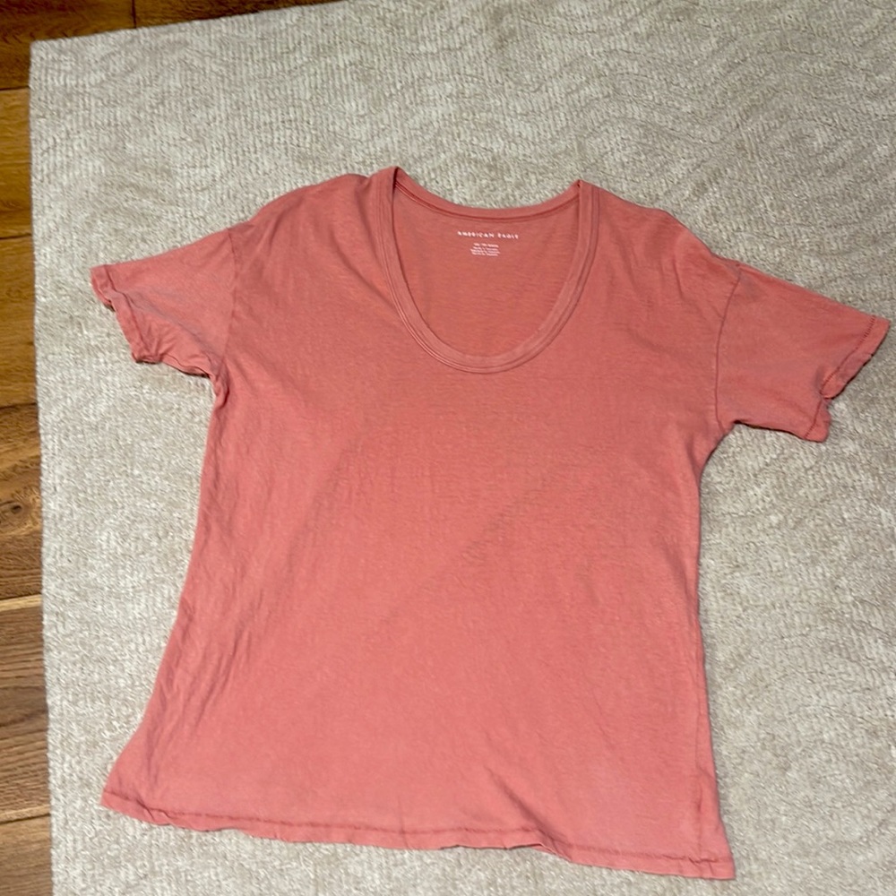 Pink, oversized, slightly distressed American Eagle scoop neck t-shirt. Size XS